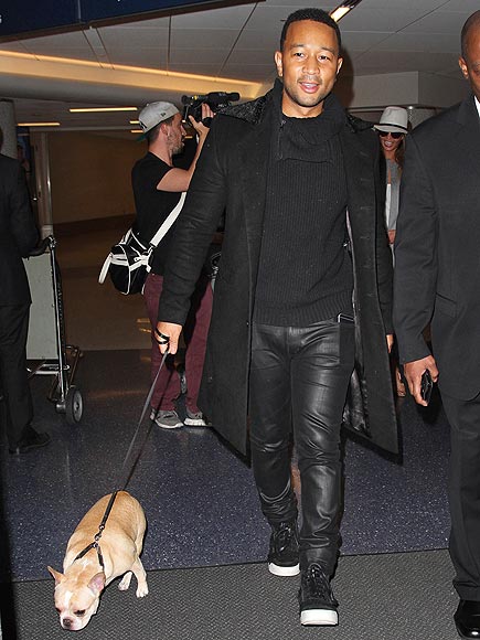 John Legend & Chrissy Teigen Touch Down At LAX With Their Dogs