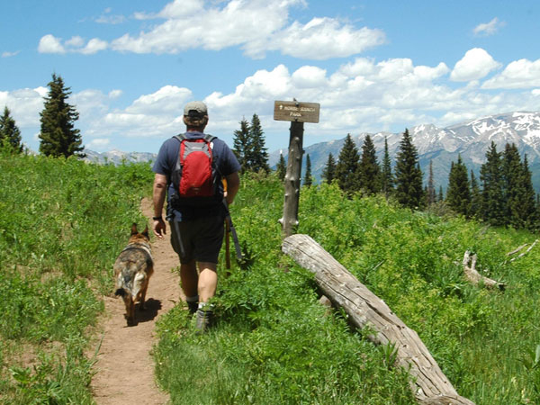 man-and-dog-hiking