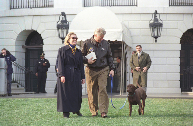 hillary and bill with dog
