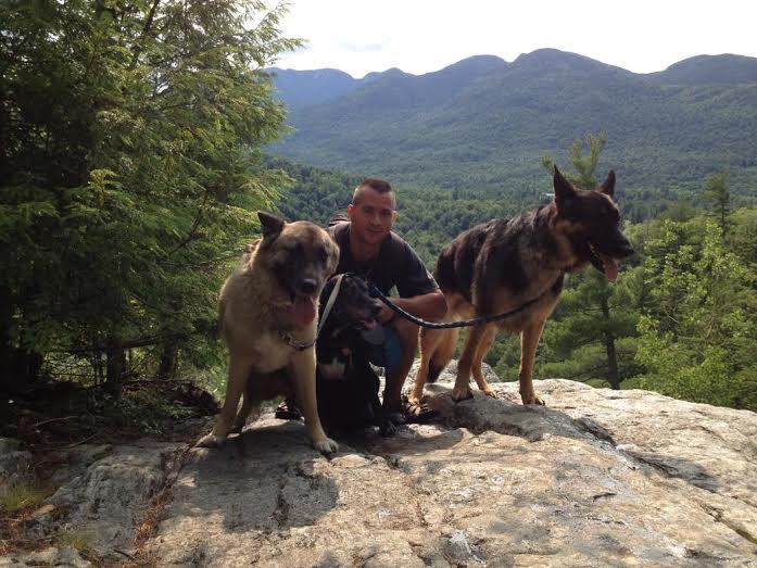Trooper Spallone with his own canine family