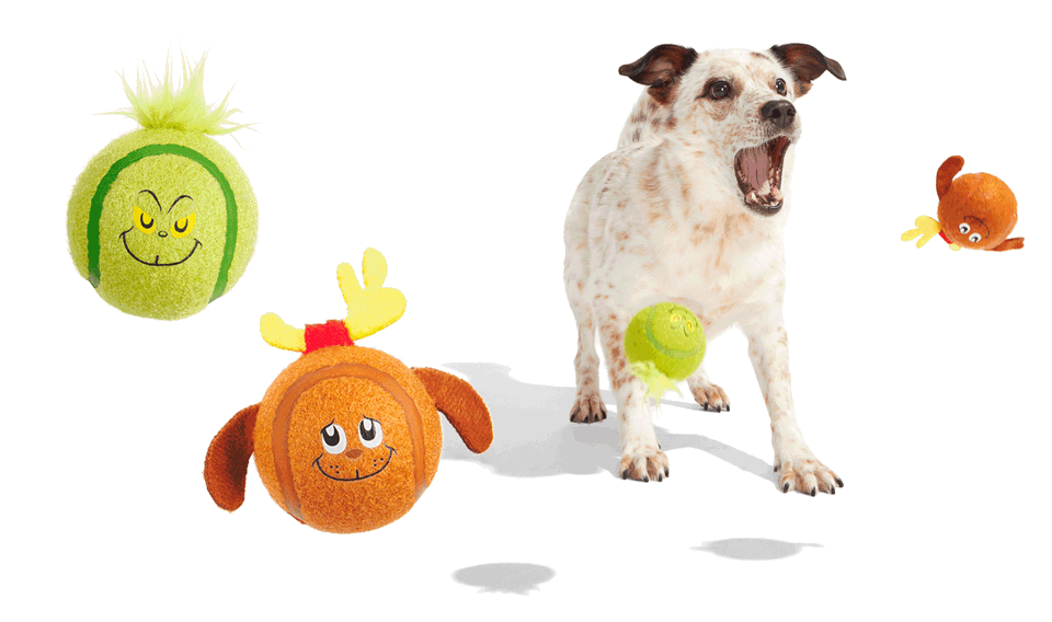 Tennis balls themed like the Grinch and Max from the Barkbox toy collection