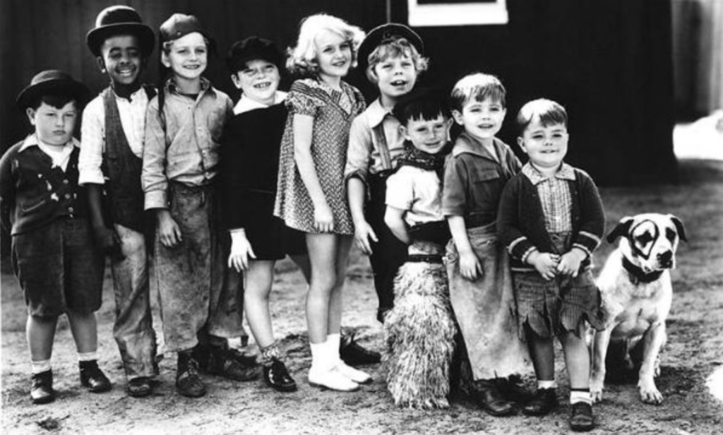 A photo of the little rascals and their pit bull Petey.