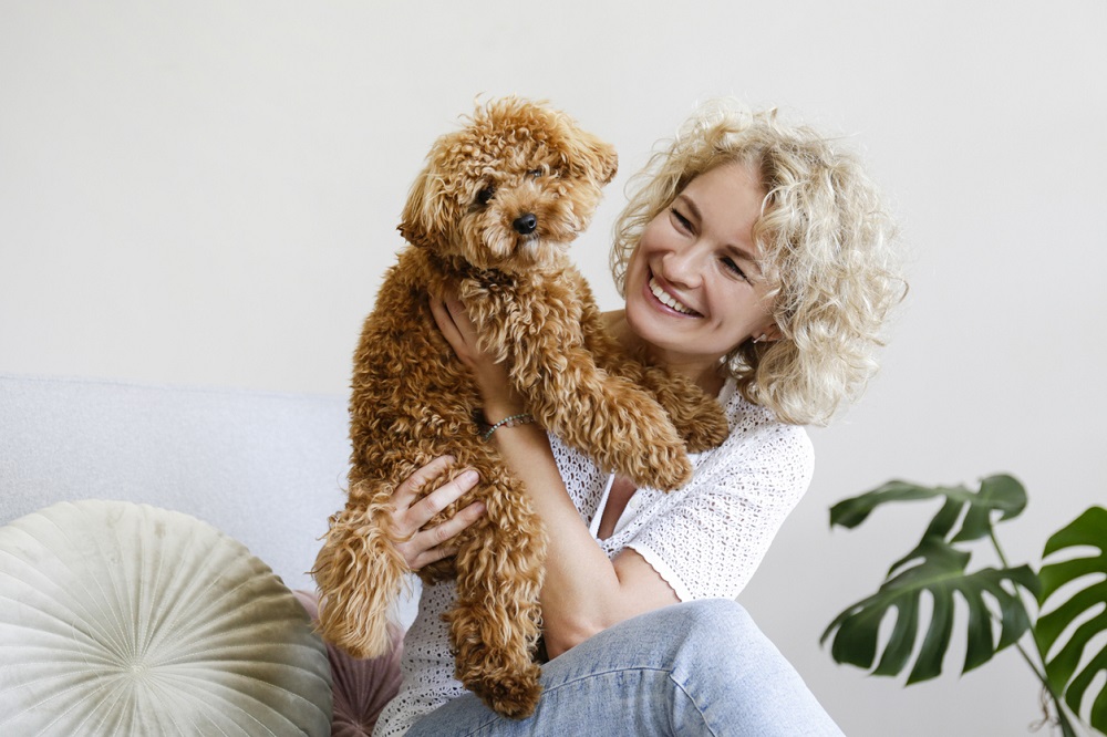 Maltipoo and owner